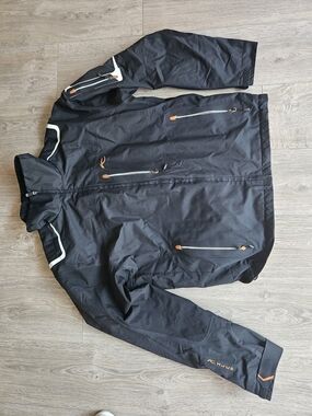 Men's Black Ski Jacket with Orange Accents by KJUS